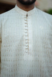 Elegant Off-White Striped Embroidered Kurta With Potli Buttons